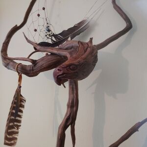 Handcrafted Wooden Eagle Sculpture with Feathers